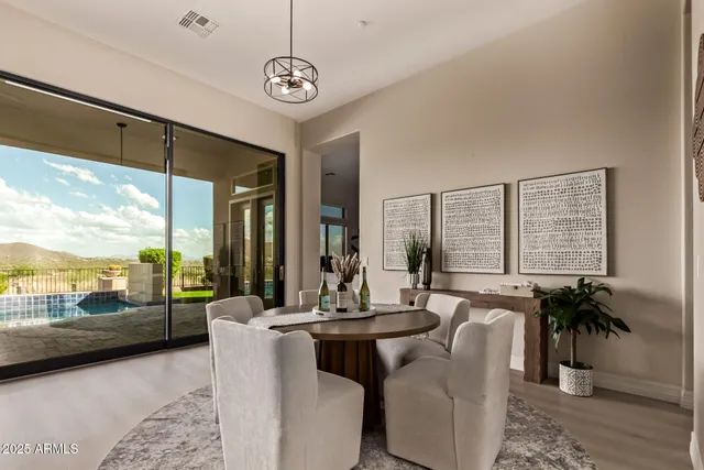 a view of a bathroom with a shower and a sink
