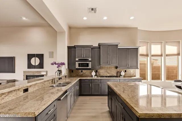 a bathroom with a sink a toilet and a bathtub
