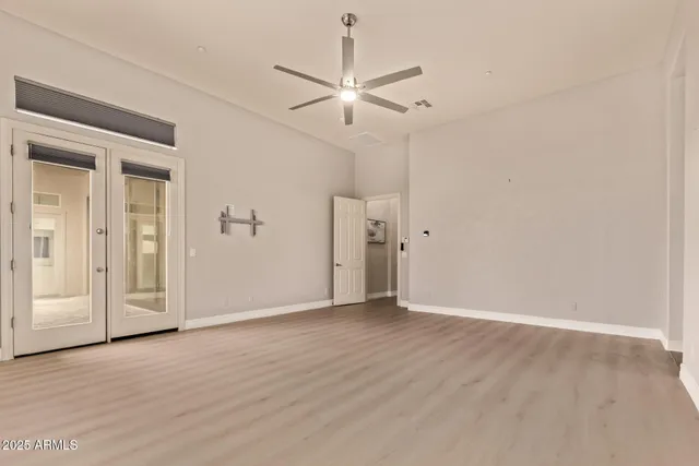 a bathroom with a sink a toilet and shower curtain