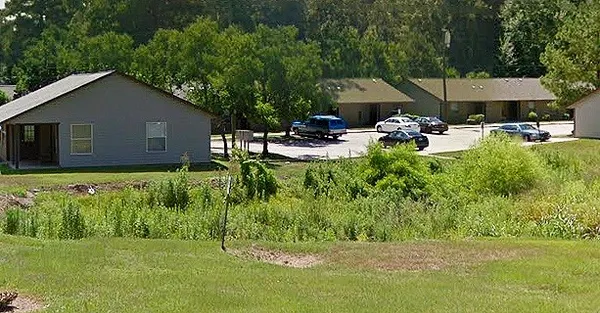 a garden view with a seating space