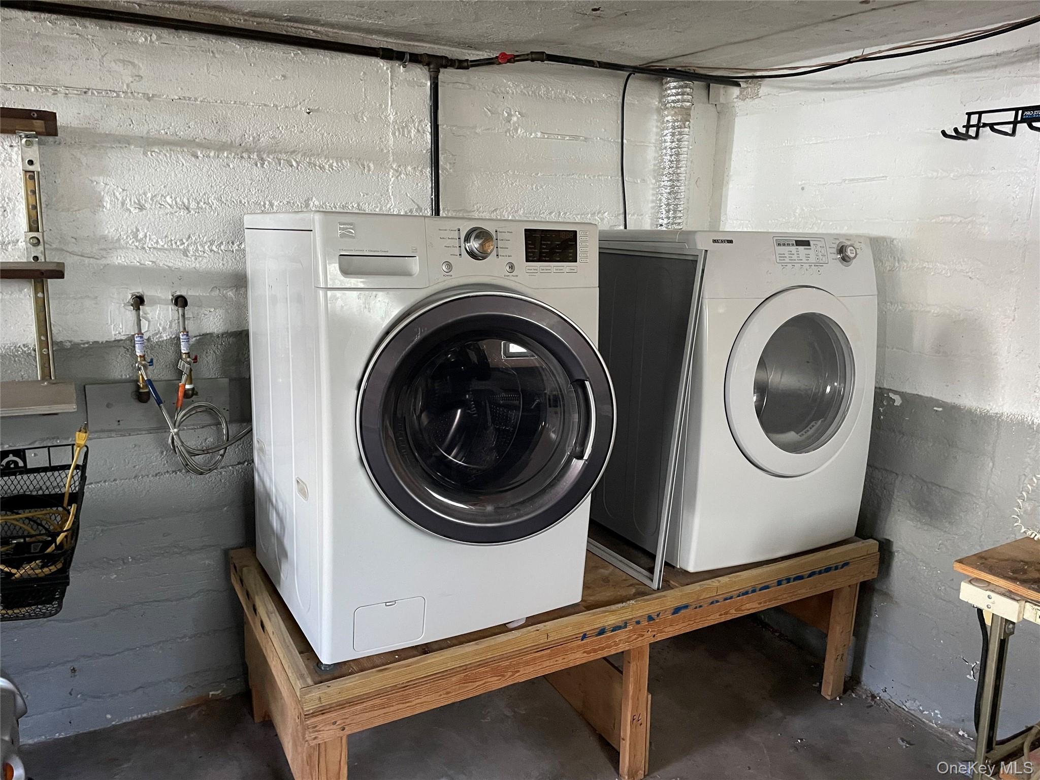 8 Cameron Lane Valley Stream, NY 11581 - Photo 25 of 33 washer & dryer in the garage
