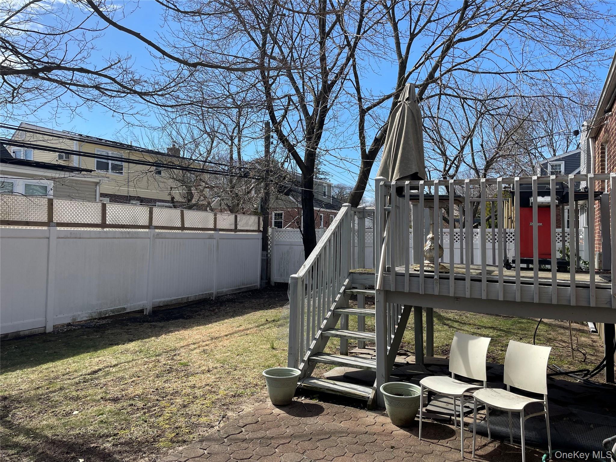 8 Cameron Lane Valley Stream, NY 11581 - Photo 33 of 33 backyard w/ small deck