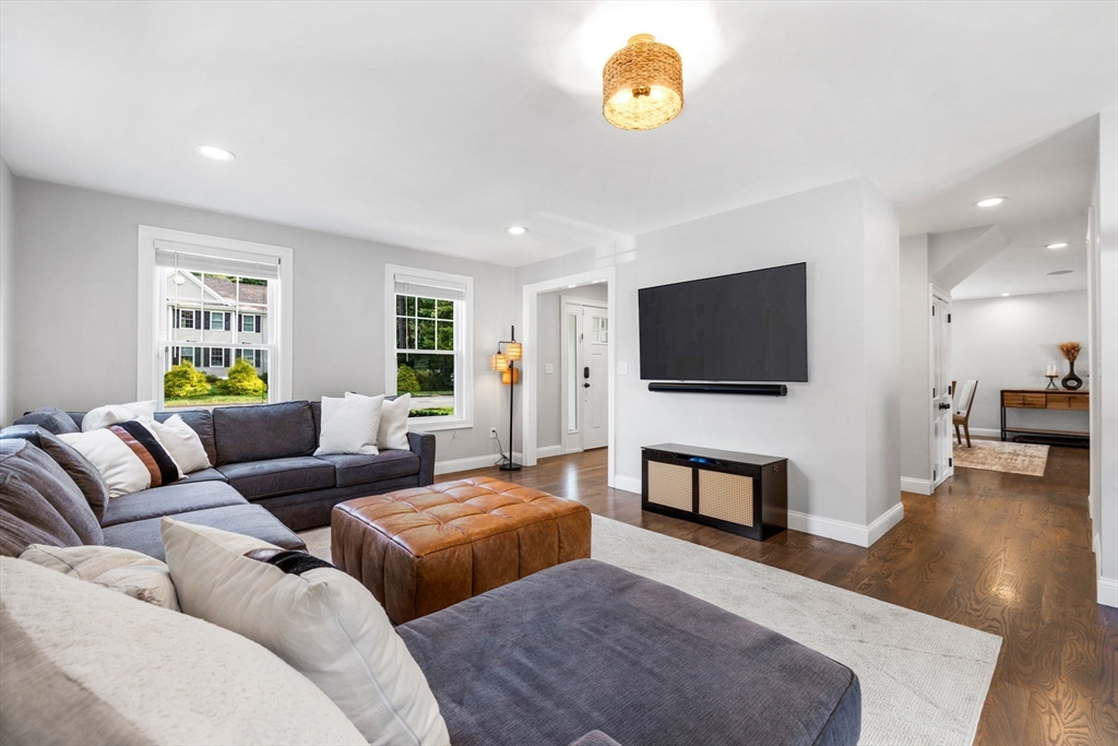 138 Dedham Street Canton, MA 02021 - Photo 17 of 41 a living room with furniture and a flat screen tv