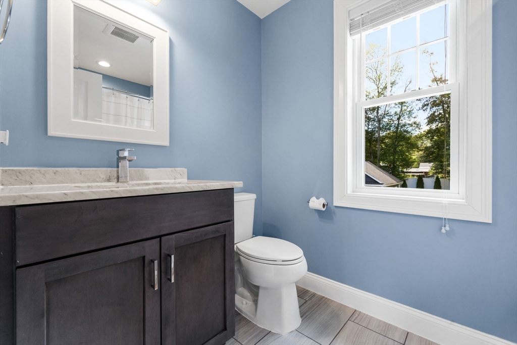 138 Dedham Street Canton, MA 02021 - Photo 18 of 41 a bathroom with a sink and a toilet