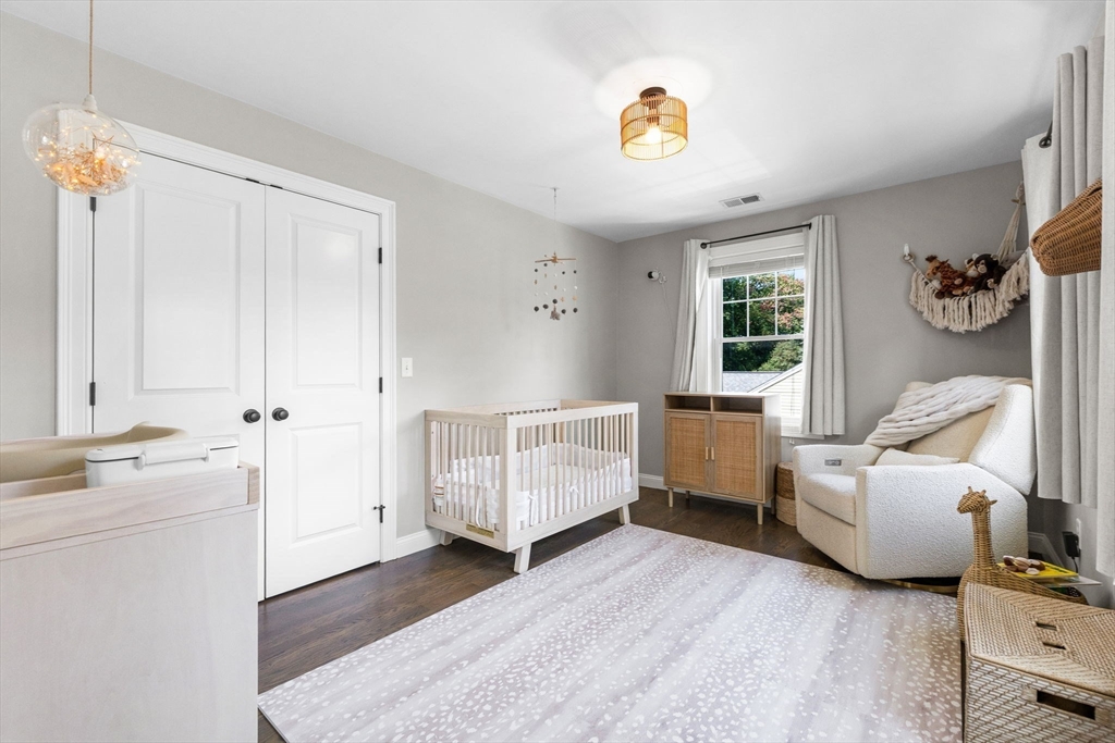138 Dedham Street Canton, MA 02021 - Photo 25 of 41 a bedroom with furniture and a window