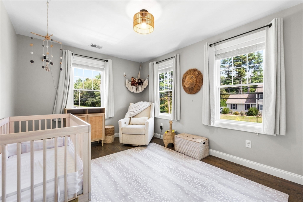 138 Dedham Street Canton, MA 02021 - Photo 26 of 41 a bedroom with furniture and a window