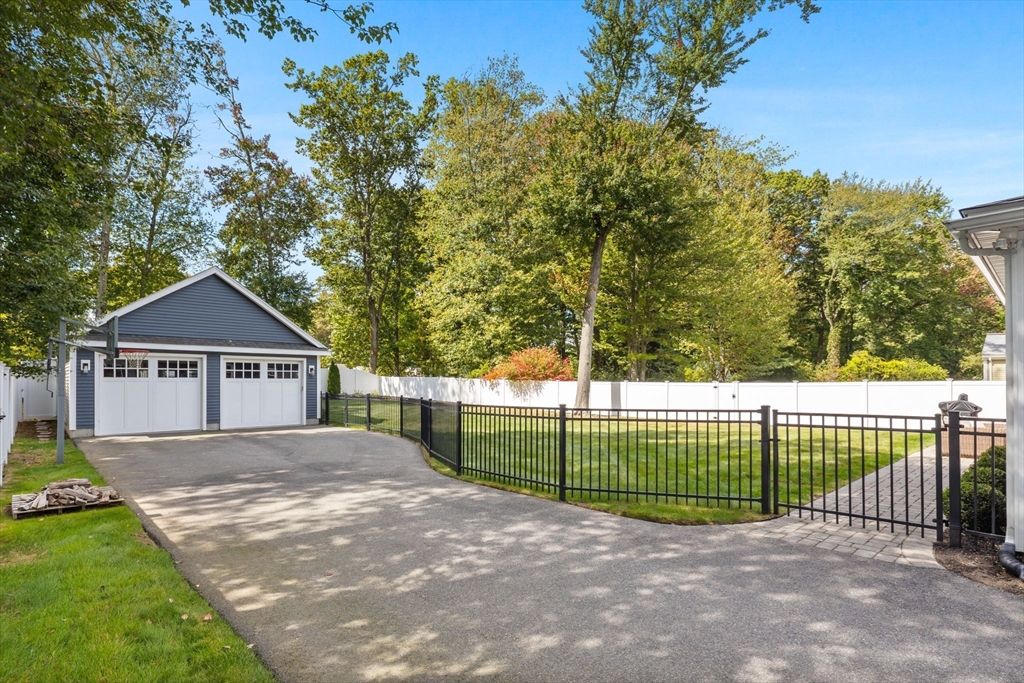 138 Dedham Street Canton, MA 02021 - Photo 33 of 41 a view of a backyard with a small yard