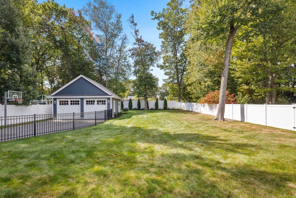138 Dedham Street Canton, MA 02021 - Photo 37 of 41 a view of a house with a yard and a fountain