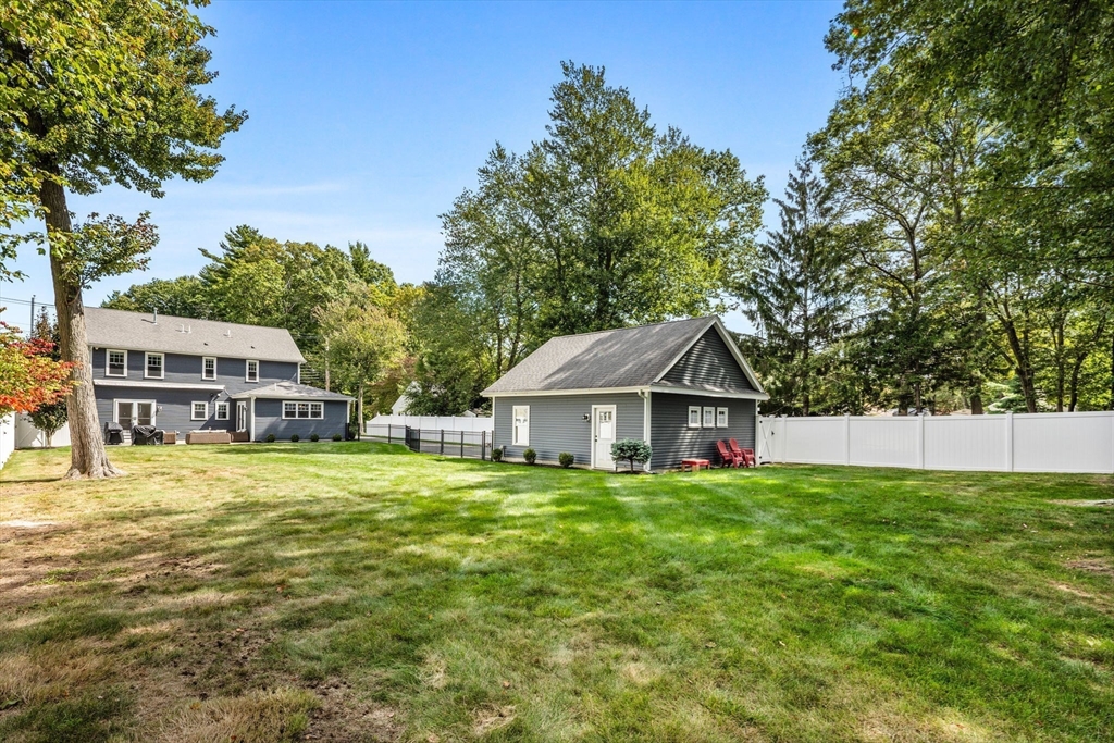 138 Dedham Street Canton, MA 02021 - Photo 38 of 41 a front view of a house with a yard