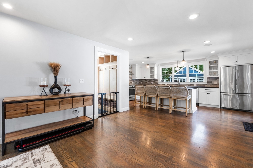 138 Dedham Street Canton, MA 02021 - Photo 8 of 41 a view of kitchen with stainless steel appliances dining table chairs and stove