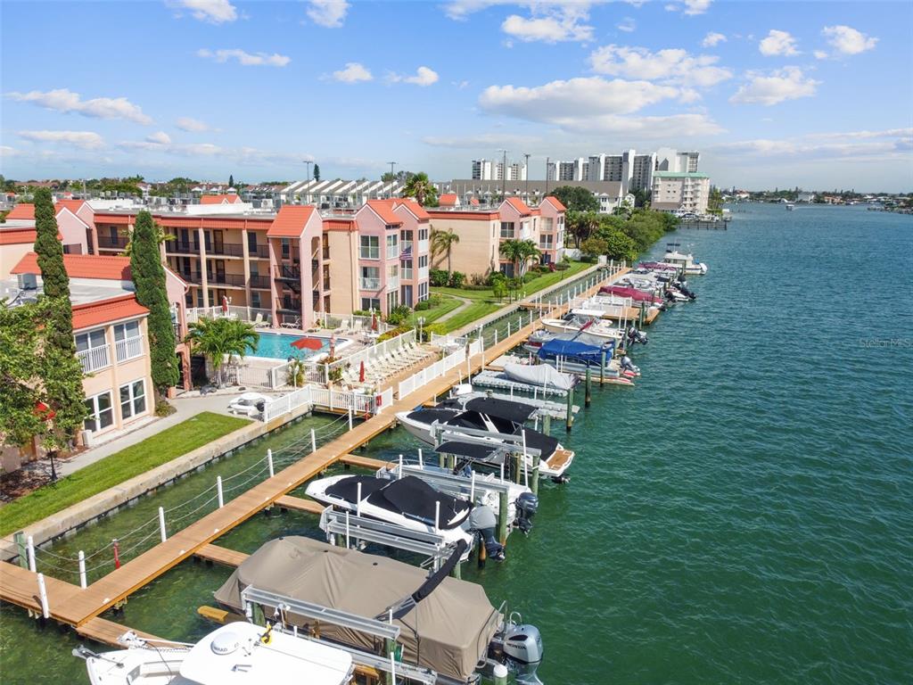 8901 Blind Pass Road, Unit 228 St. Pete Beach, FL 33706 - Photo 26 of 29 a view of a city with tall buildings