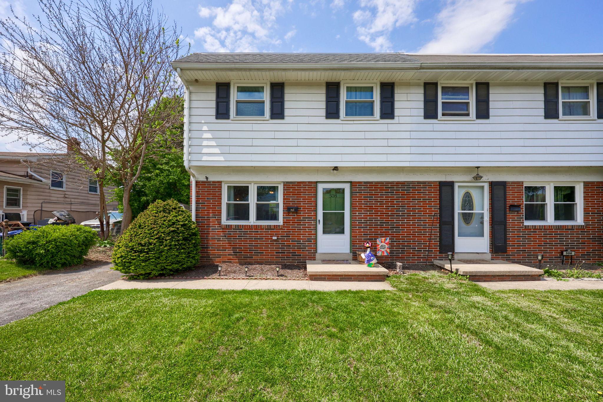 508 West Marion Street Lititz, PA 17543 - Photo 1 of 32 a front view of a house with a yard and outdoor seating