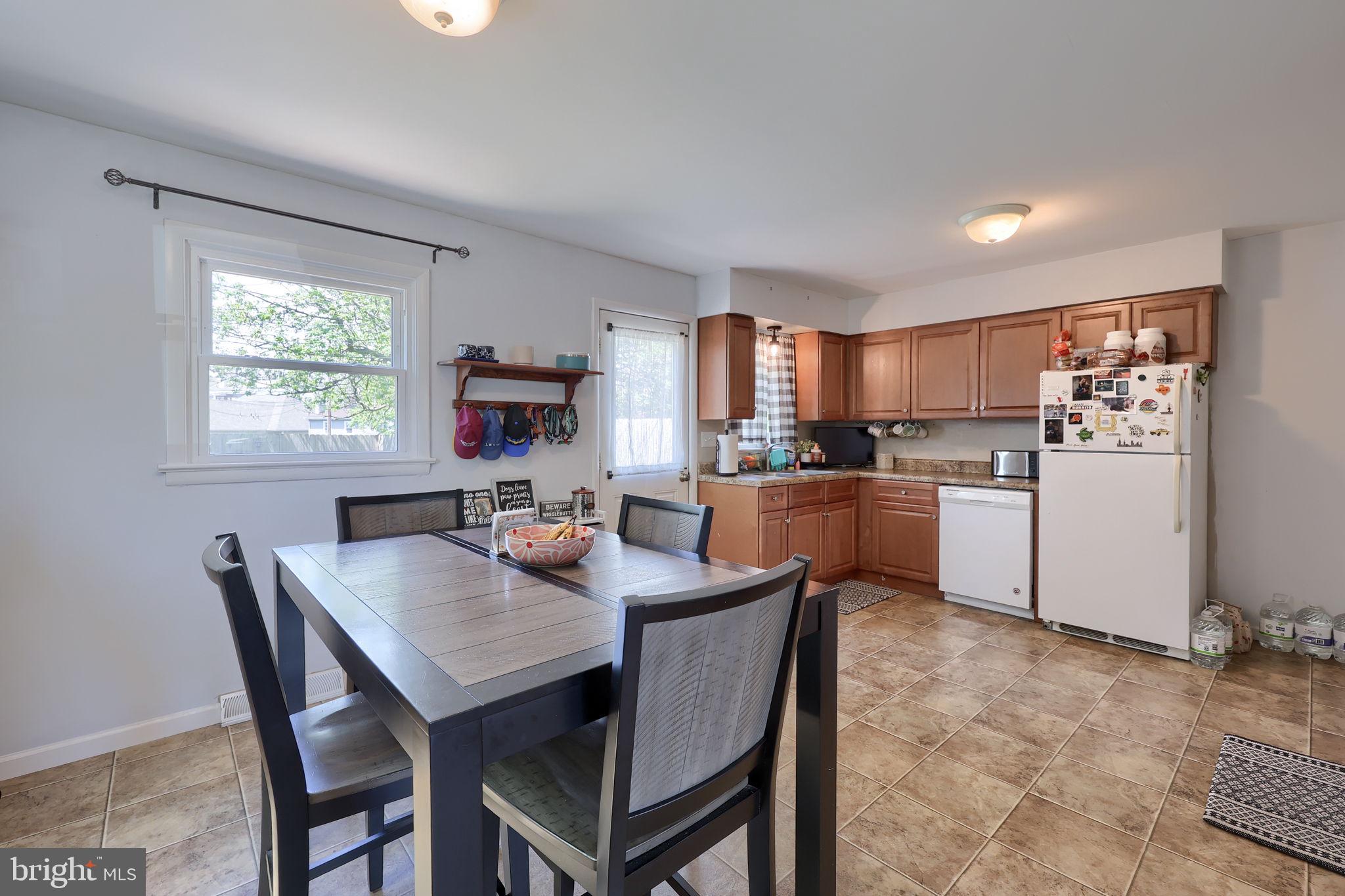 508 West Marion Street Lititz, PA 17543 - Photo 12 of 32 a view of a dining room with furniture and a kitchen