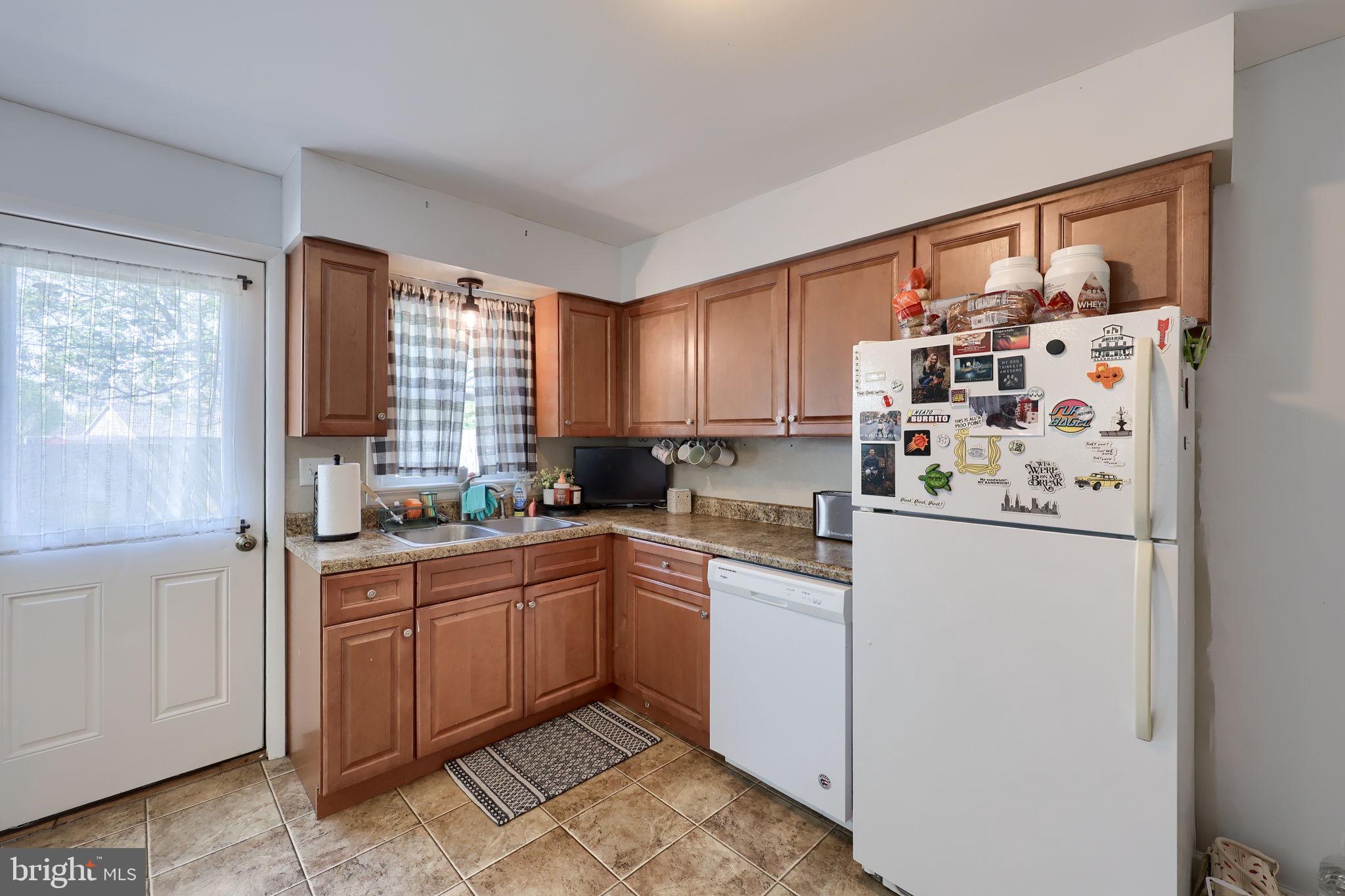 508 West Marion Street Lititz, PA 17543 - Photo 14 of 32 a kitchen with white cabinets and white appliances