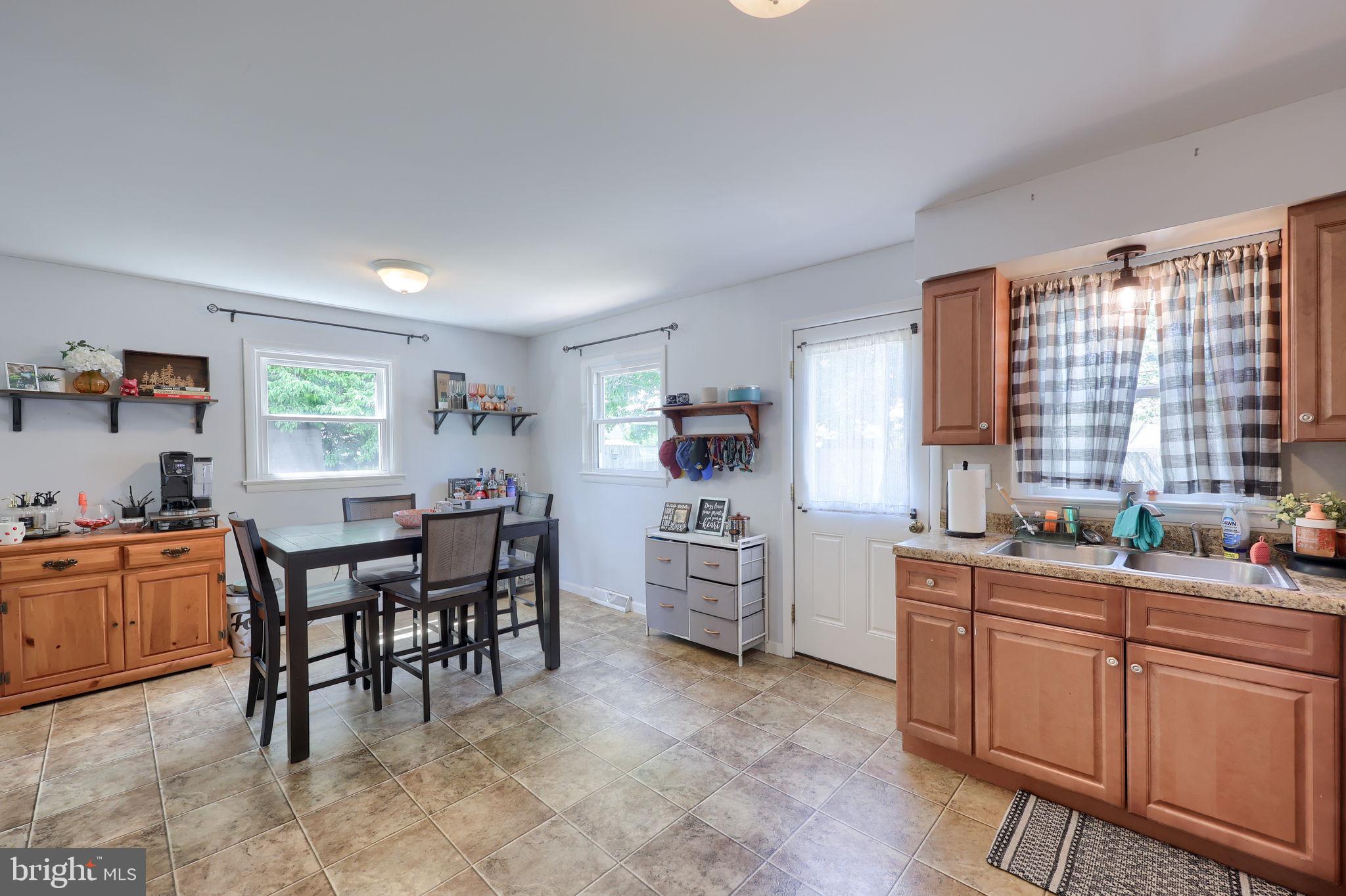 508 West Marion Street Lititz, PA 17543 - Photo 15 of 32 a kitchen with cabinets and chairs