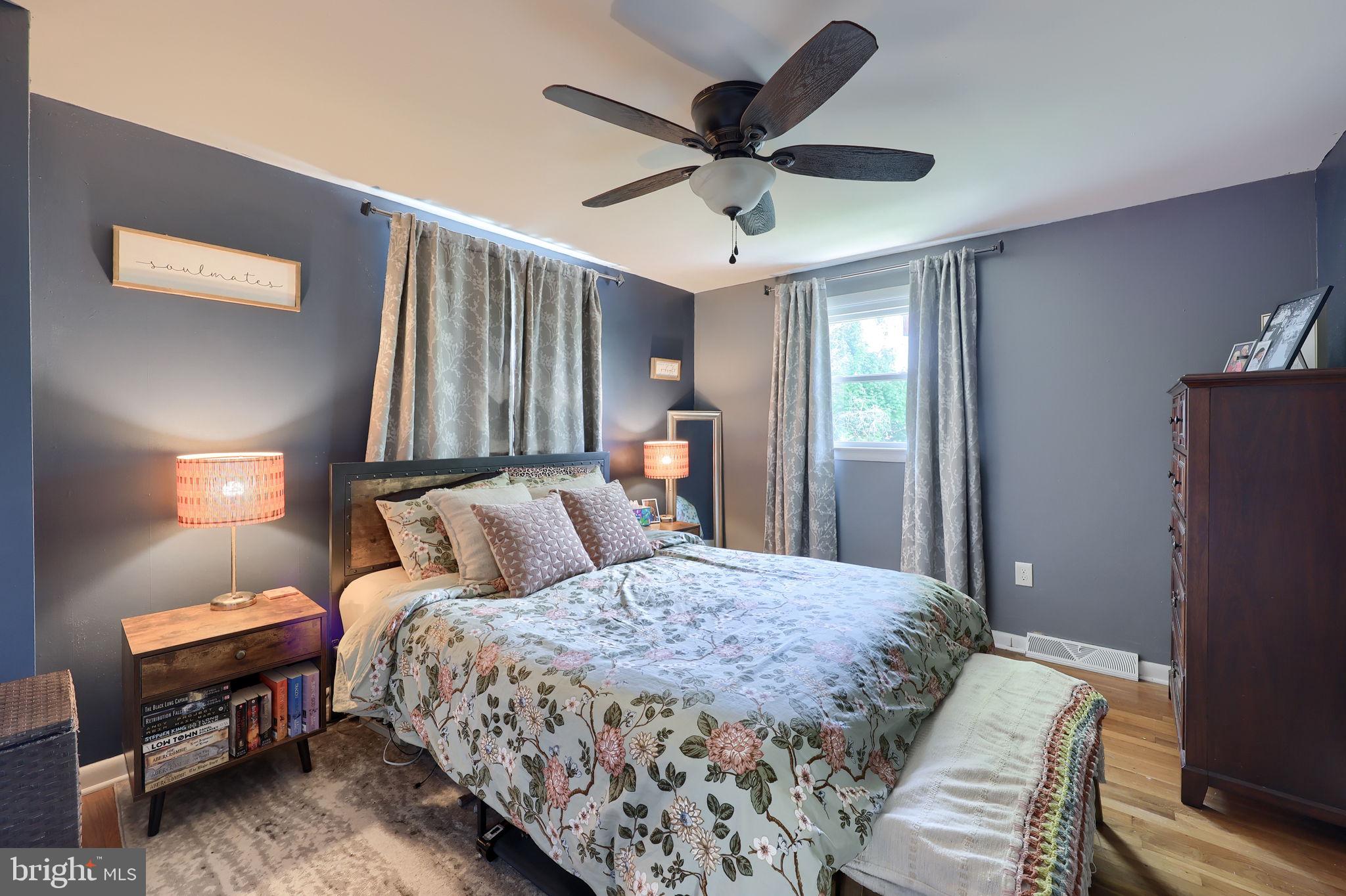 508 West Marion Street Lititz, PA 17543 - Photo 19 of 32 a bedroom with a bed and a chandelier