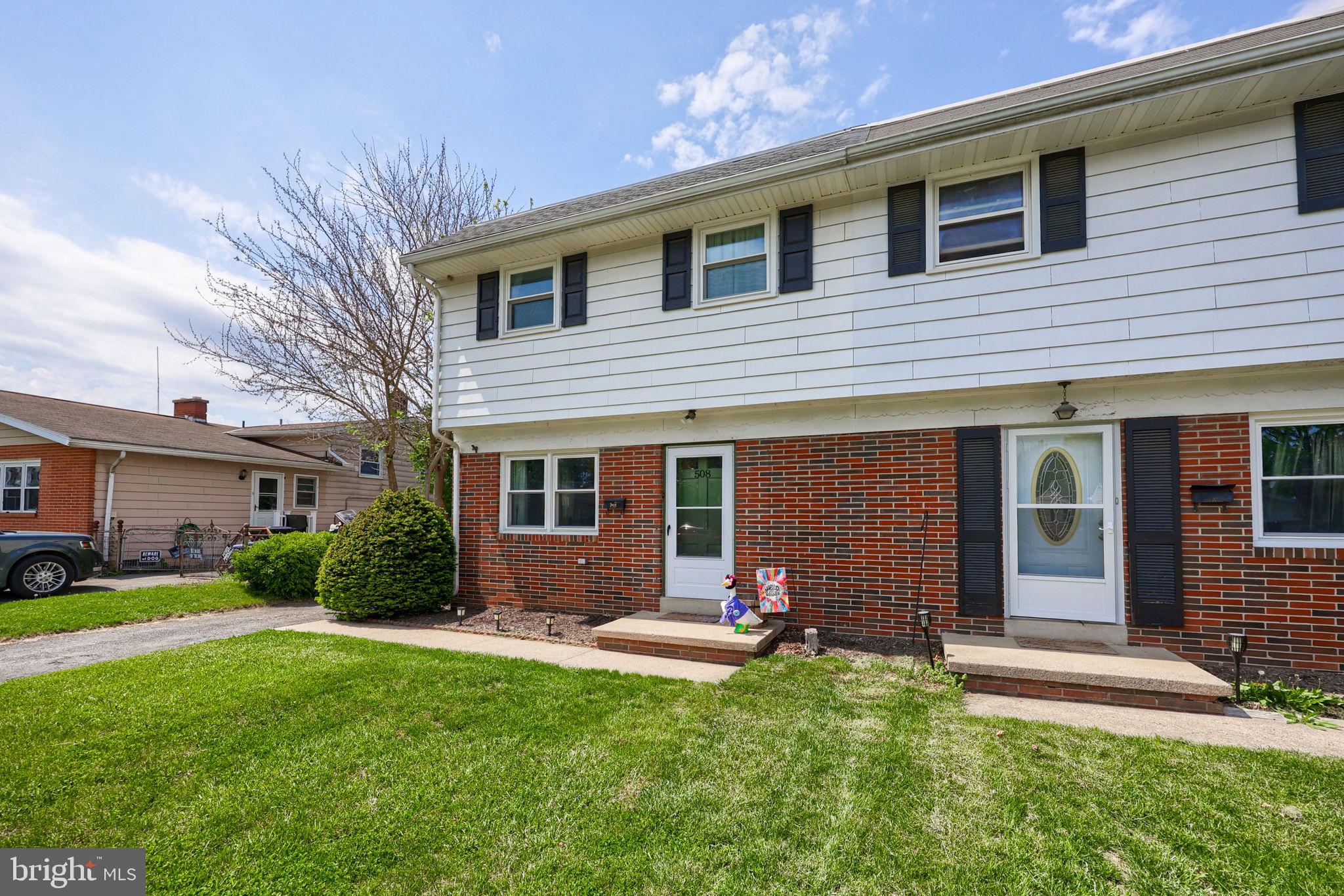508 West Marion Street Lititz, PA 17543 - Photo 2 of 32 a front view of a house with a yard and porch