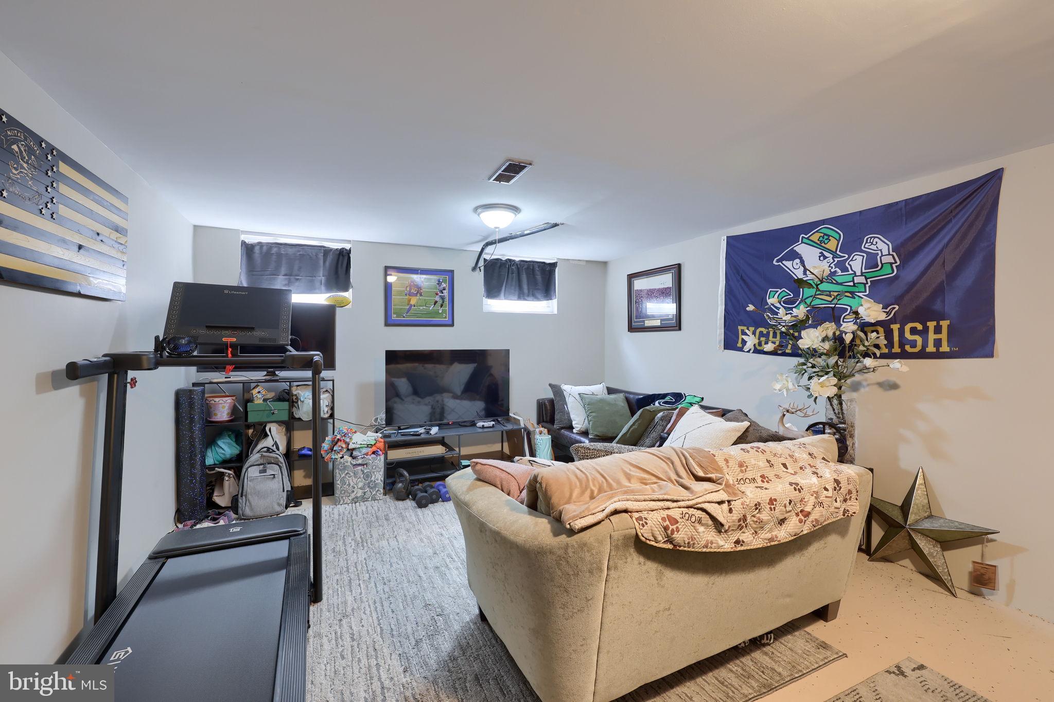 508 West Marion Street Lititz, PA 17543 - Photo 26 of 32 a living room with furniture and a flat screen tv