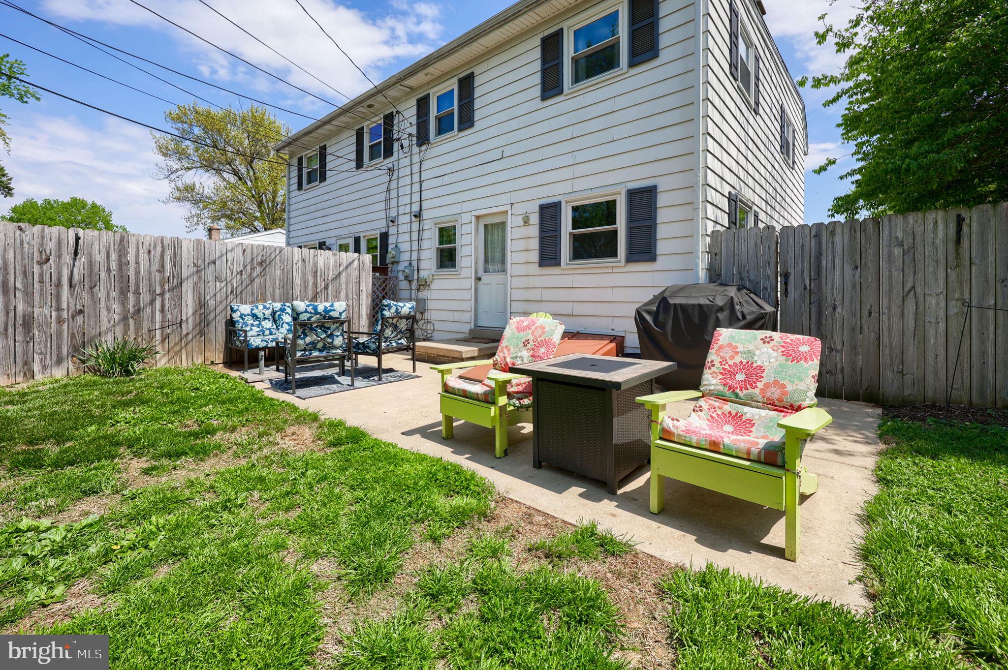 508 West Marion Street Lititz, PA 17543 - Photo 30 of 32 a backyard of a house with fire pit and outdoor seating