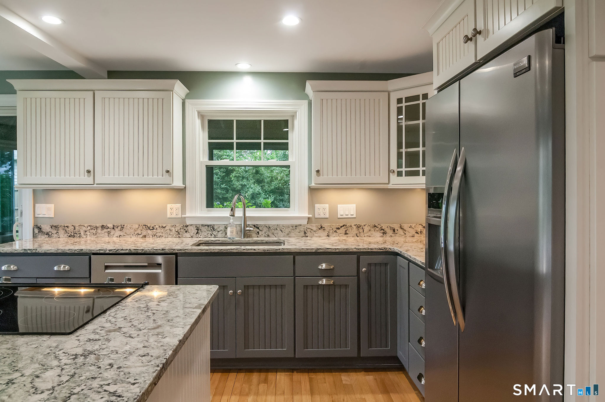 44 Pent Road Madison, CT 06443 - Photo 10 of 24 Beautifully remodeled kitchen with stainless appliances and quartz counters