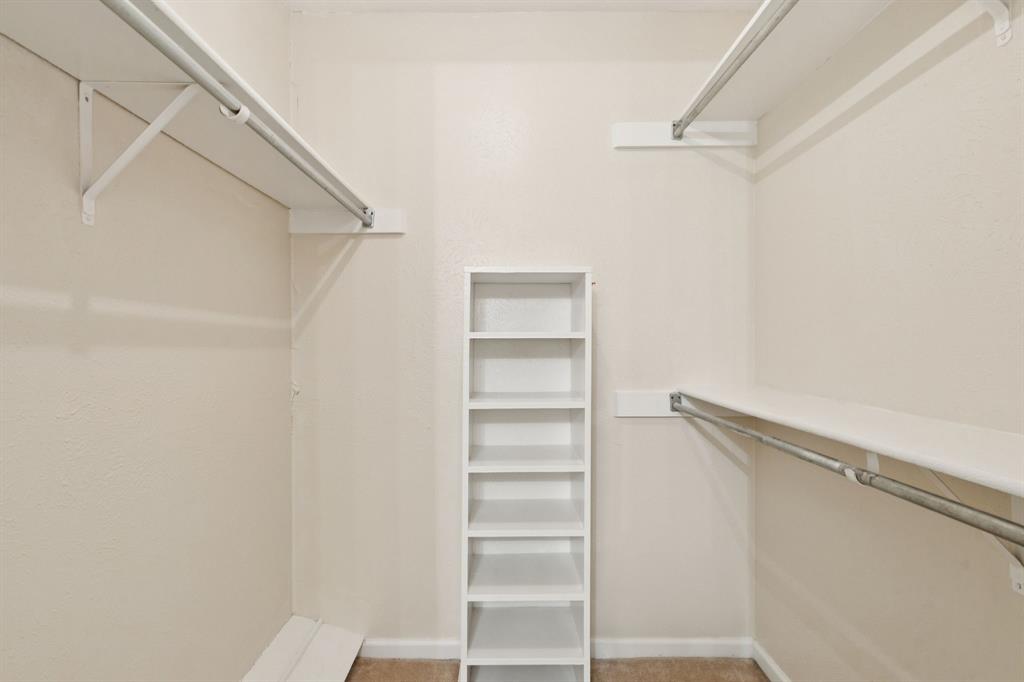 4569 North O'Connor Road, Unit 1320 Irving, TX 75062 - Photo 14 of 24 a view of walk in closet with empty racks