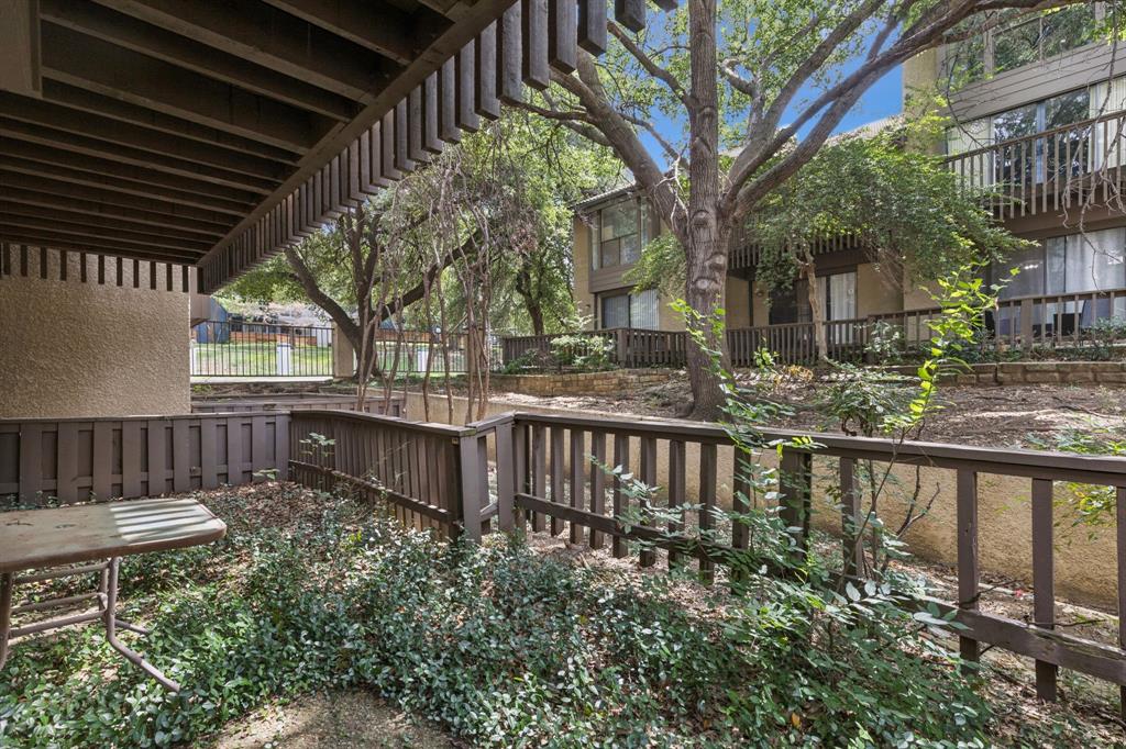 4569 North O'Connor Road, Unit 1320 Irving, TX 75062 - Photo 23 of 24 a view of a chair and table in the patio