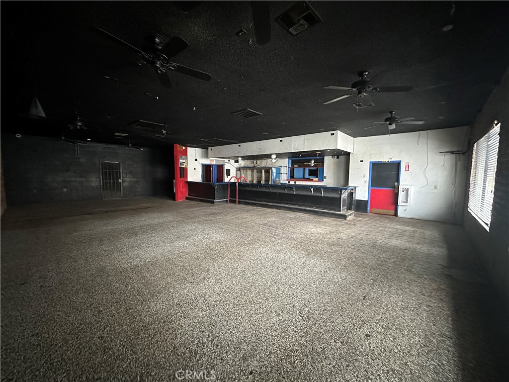 230 Fox Street Lemoore, CA 93245 - Photo 6 of 25 a view of a big room with lots of gym equipment