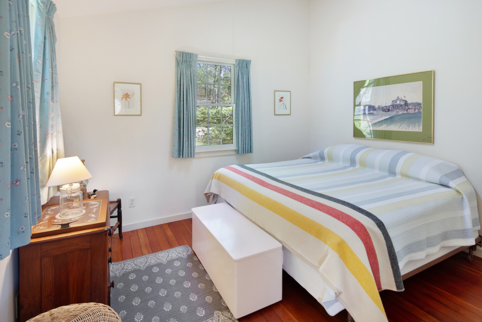 10 Abel's Neck Road Chilmark, MA 02535 - Photo 8 of 20 a bedroom with a bed and wooden floor
