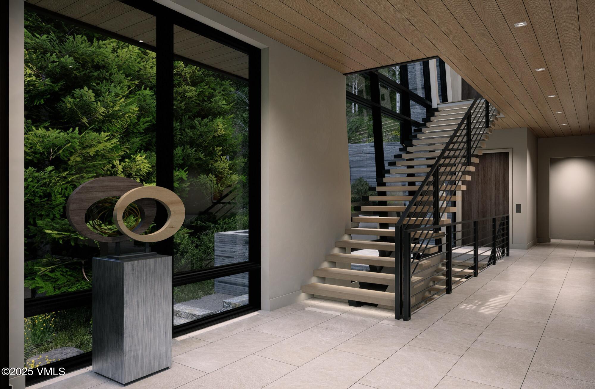 1150 Ptarmigan Road Vail, CO 81657 - Photo 19 of 36 a view of entryway with furniture and stairs