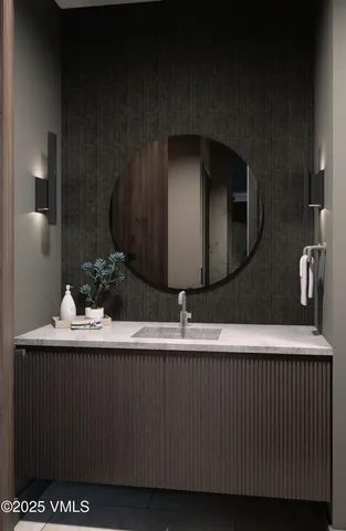 a living room with furniture and large windows