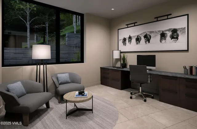 a bedroom with furniture and a large window