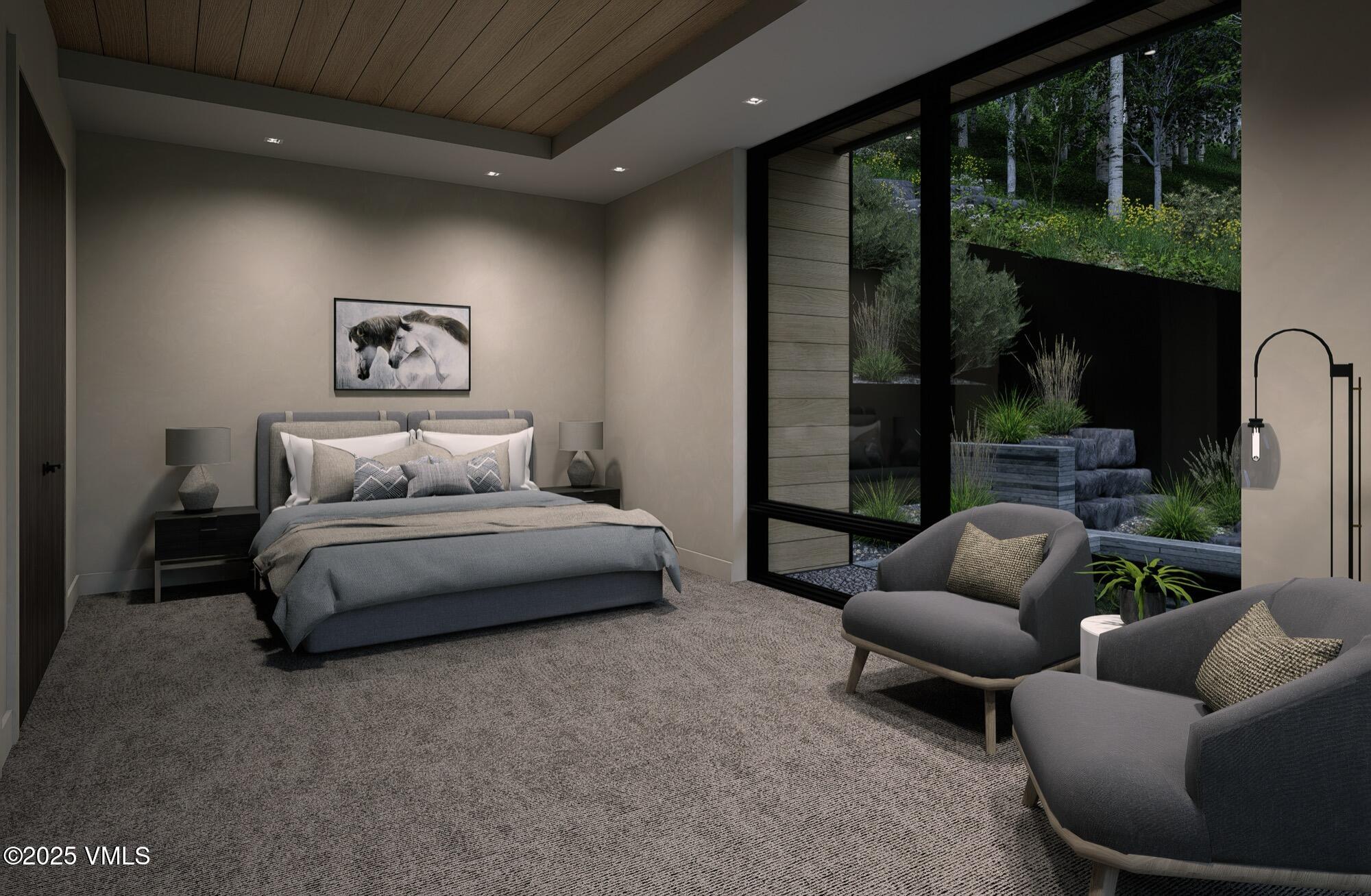 1150 Ptarmigan Road Vail, CO 81657 - Photo 27 of 36 a bedroom with furniture and a large window