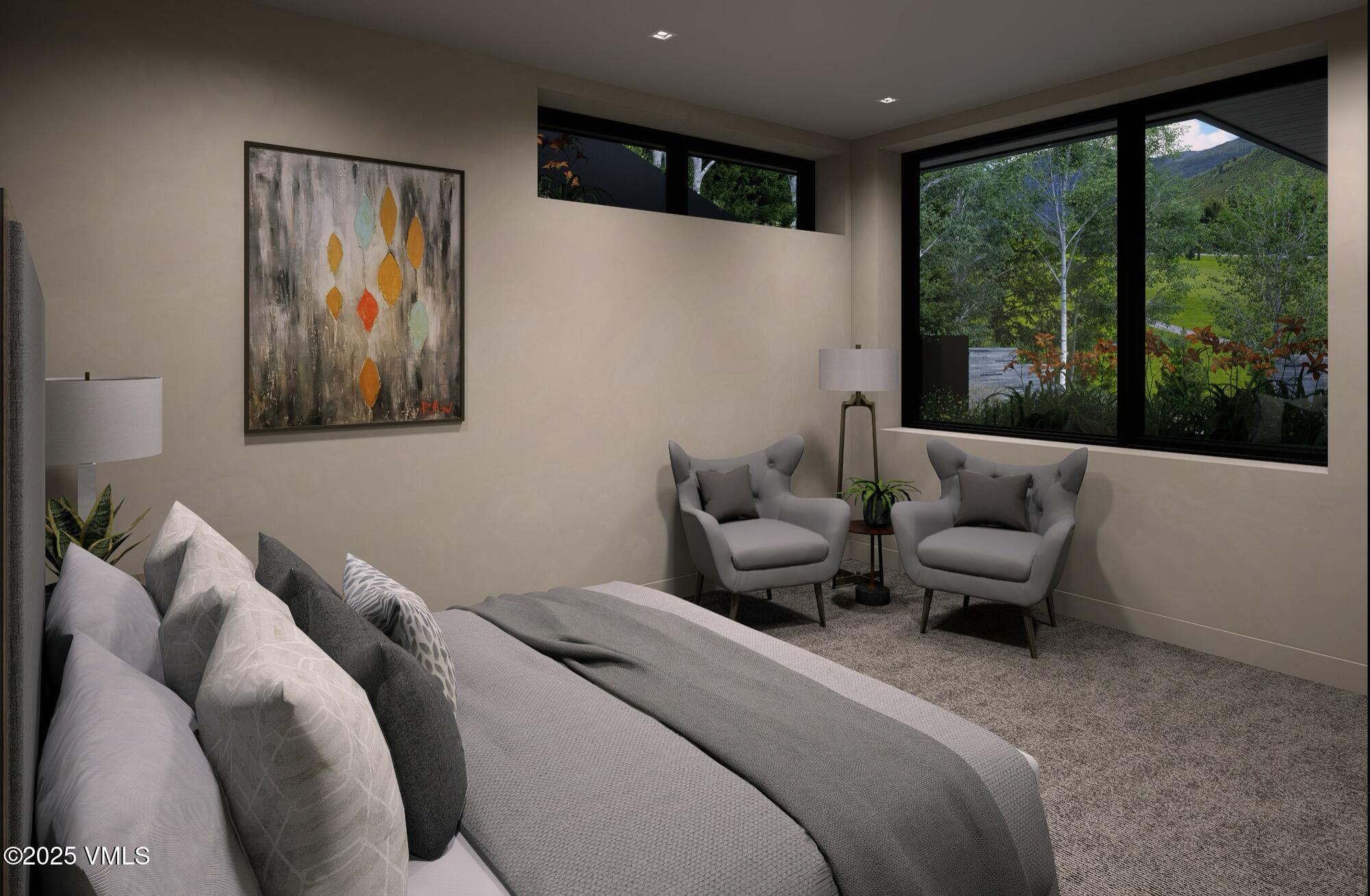 1150 Ptarmigan Road Vail, CO 81657 - Photo 30 of 36 a bedroom with a large bed and a large window