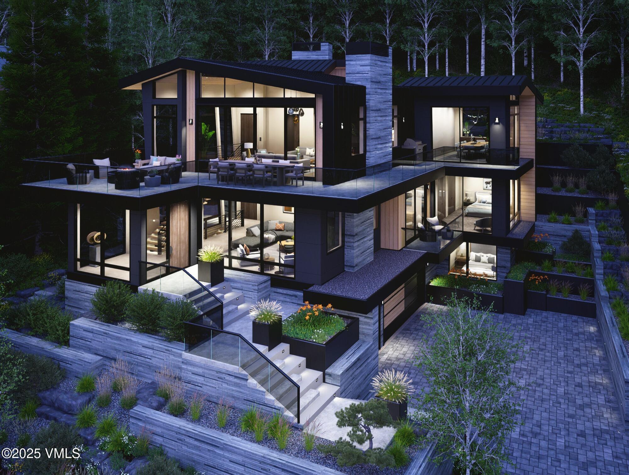 1150 Ptarmigan Road Vail, CO 81657 - Photo 34 of 36 front view of a house with a yard