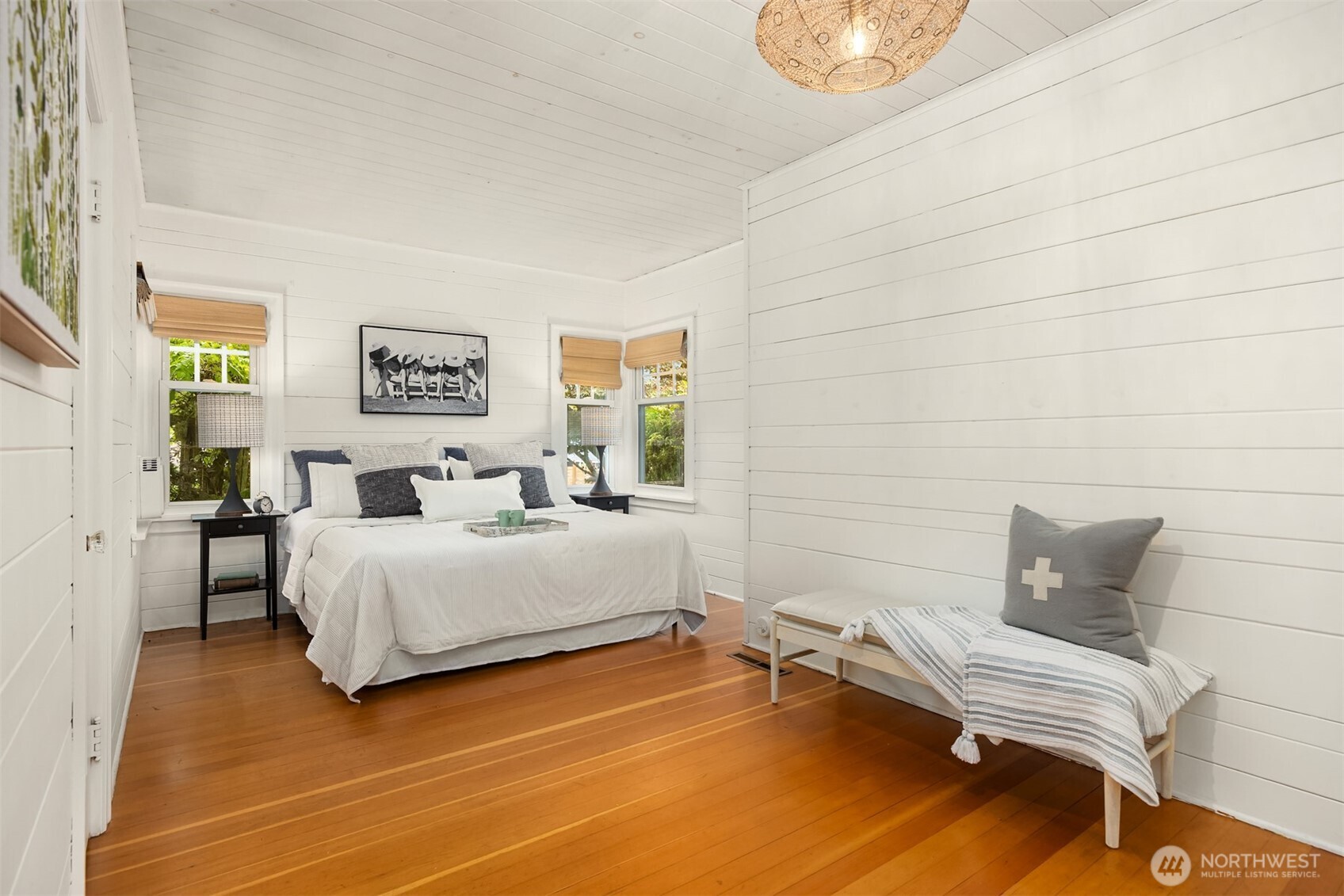 18330 9th Avenue Northeast Poulsbo, WA 98370 - Photo 13 of 32 a bedroom with a bed and a chair