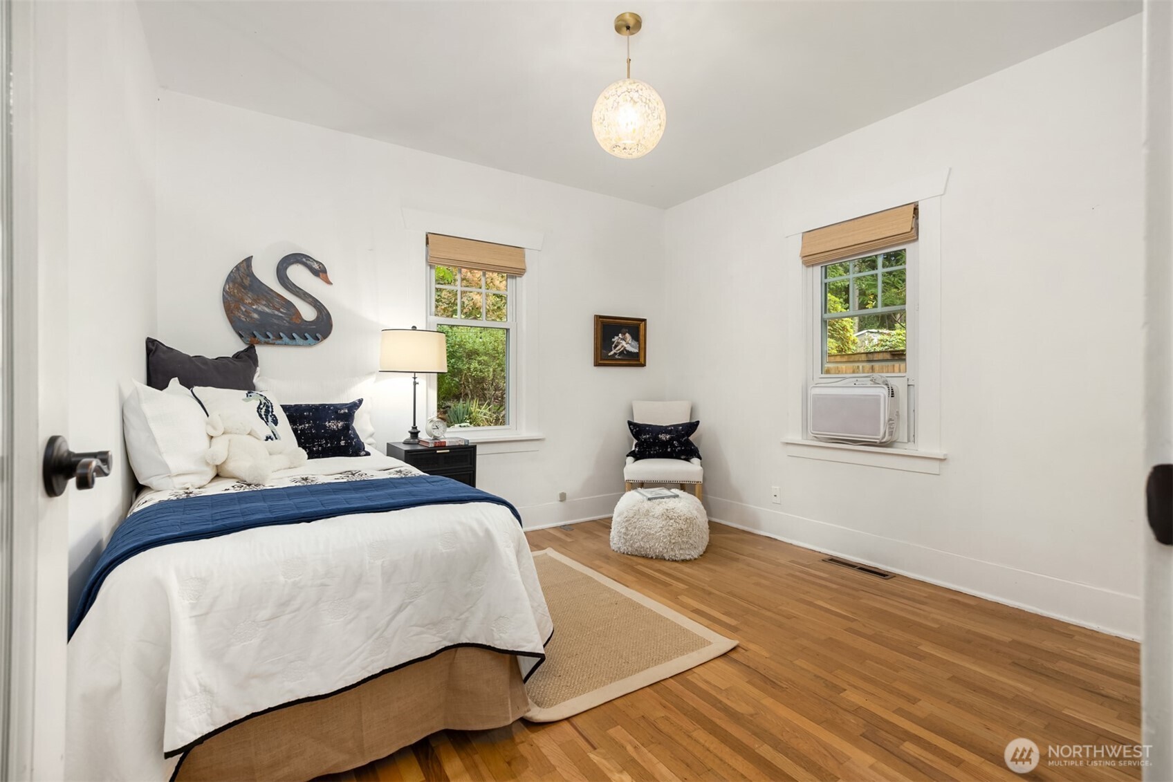 18330 9th Avenue Northeast Poulsbo, WA 98370 - Photo 16 of 32 a bedroom with bed and a window