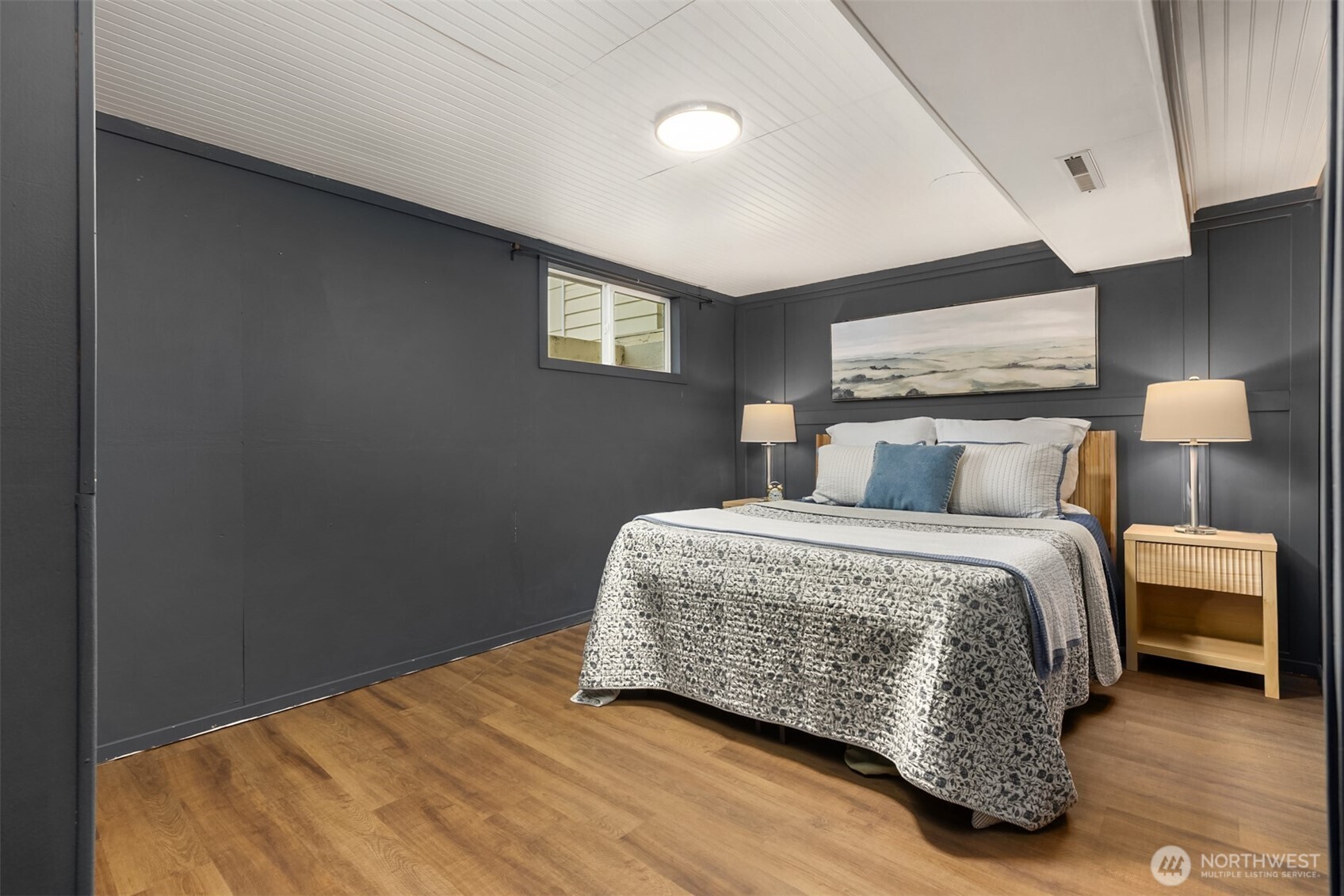 18330 9th Avenue Northeast Poulsbo, WA 98370 - Photo 20 of 32 a bedroom with a bed and a night stand