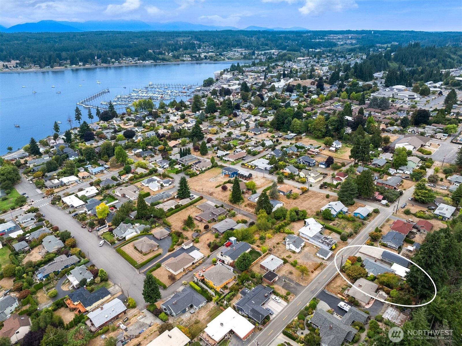 18330 9th Avenue Northeast Poulsbo, WA 98370 - Photo 32 of 32 an aerial view of residential houses with outdoor space