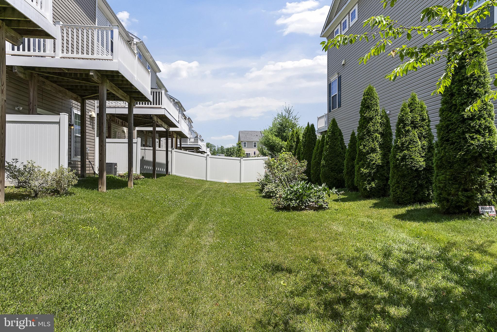 1033 Ramble Run Road Baltimore, MD 21220 - Photo 54 of 58 a view of a house with backyard and garden
