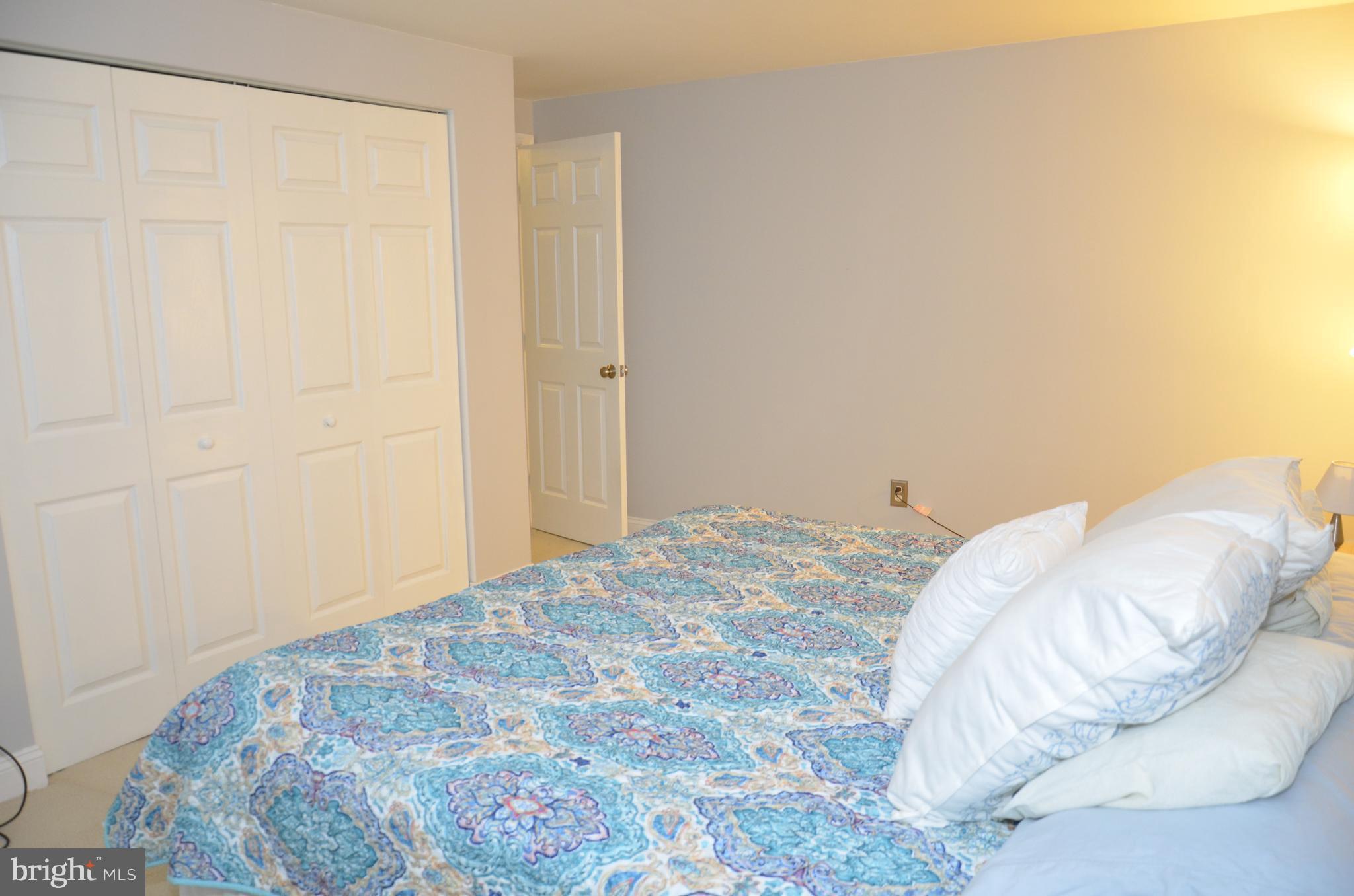 9229 Bowline Road Baltimore, MD 21236 - Photo 14 of 24 a bedroom with a bed