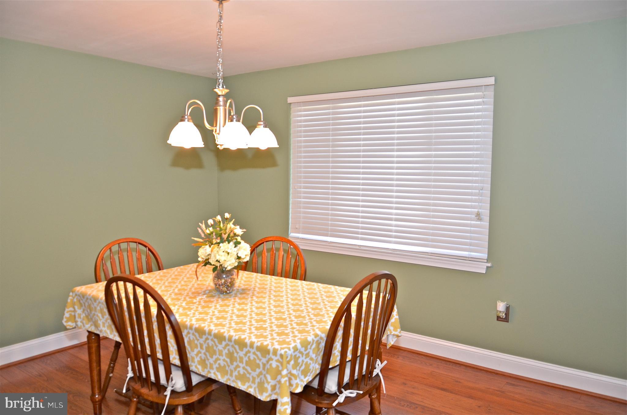 9229 Bowline Road Baltimore, MD 21236 - Photo 5 of 24 a dining room with furniture and window