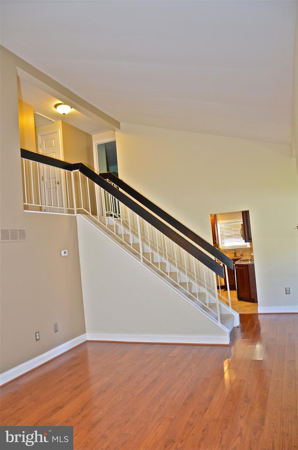 9229 Bowline Road Baltimore, MD 21236 - Photo 10 of 24 a view of an entryway with wooden floor