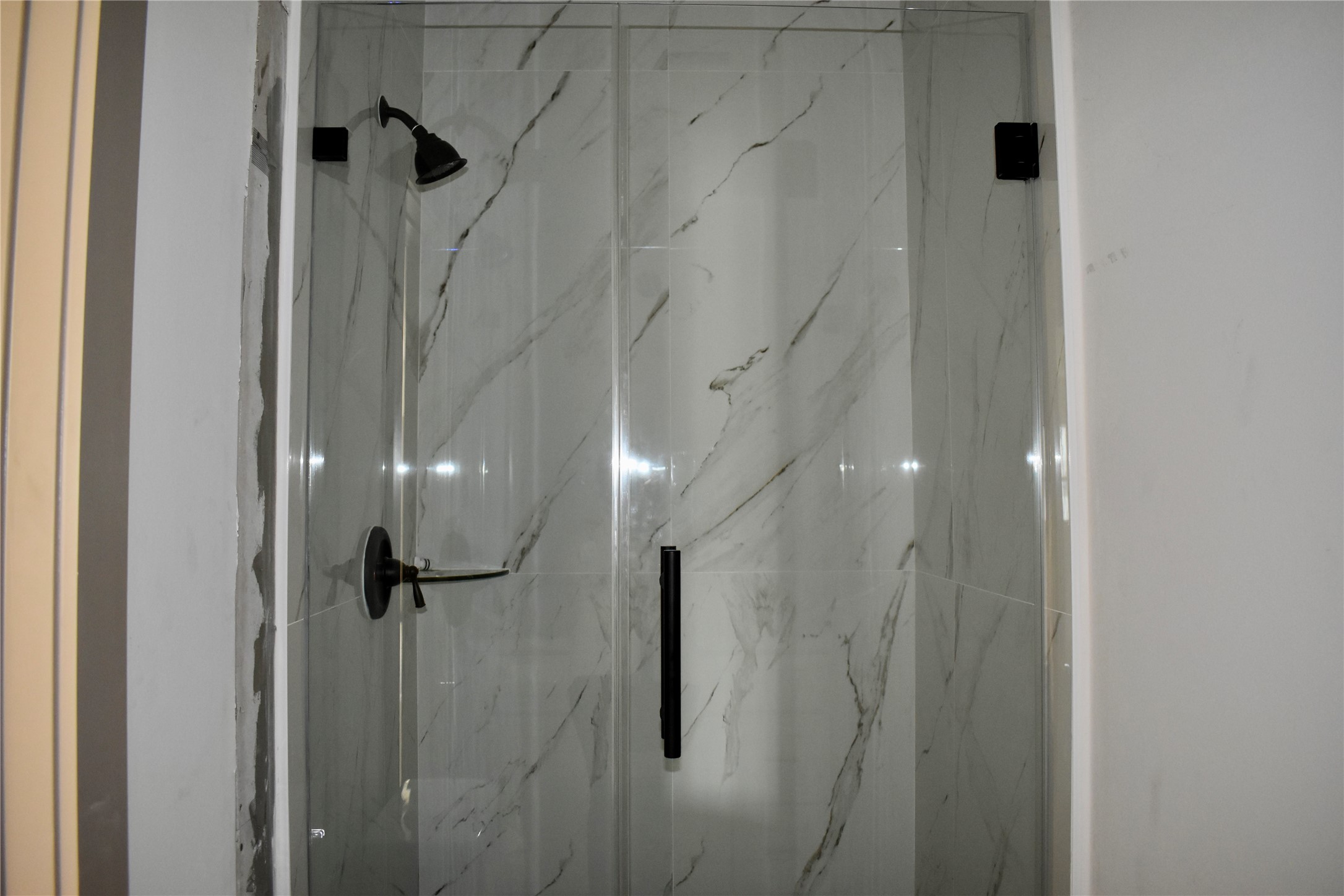 9803 Bucroft Street Houston, TX 77029 - Photo 7 of 7 a bathroom with a shower