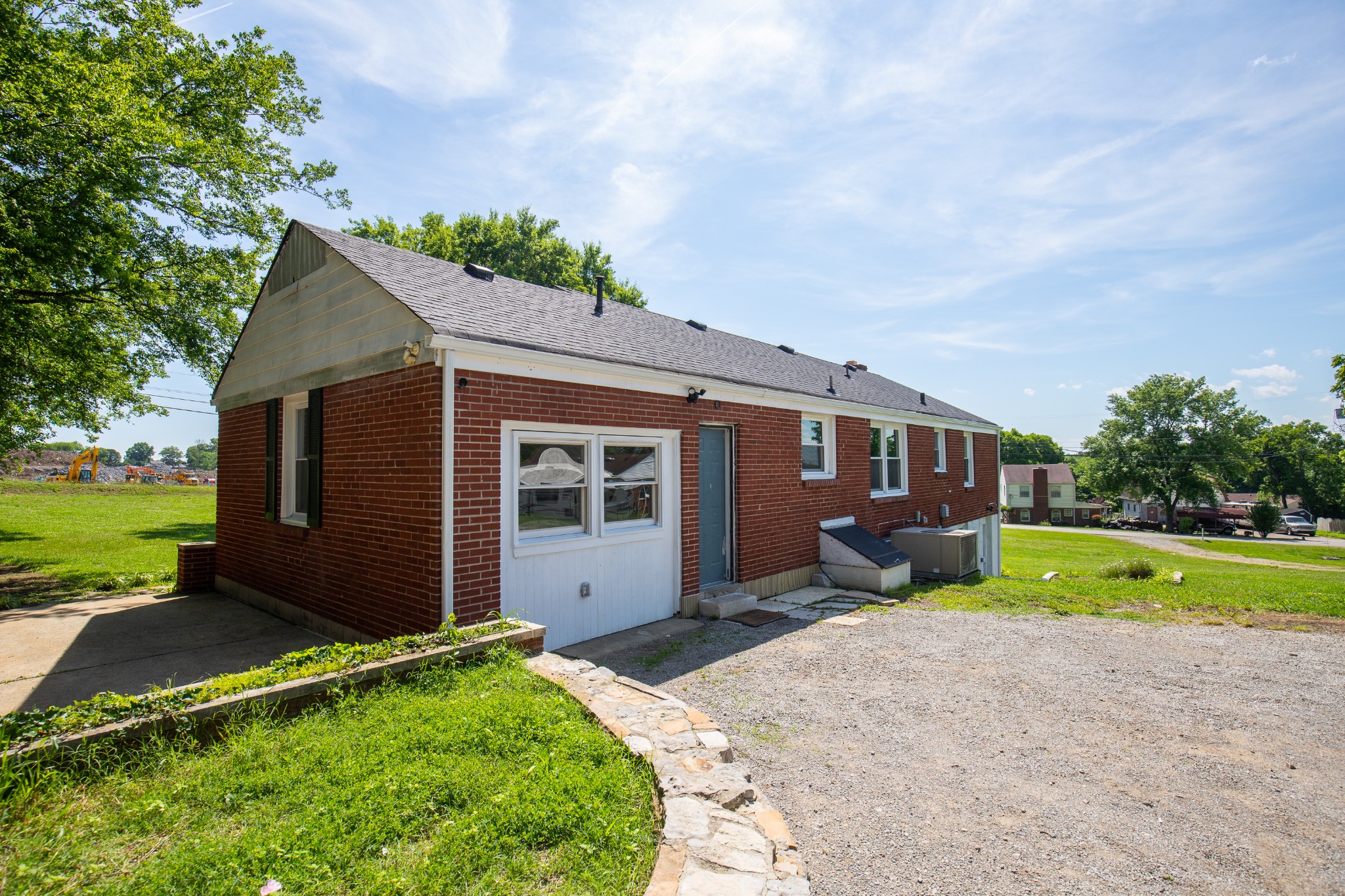 Undisclosed Address Madison, TN 37115 - Photo 14 of 17 a view of a house with backyard porch and garden