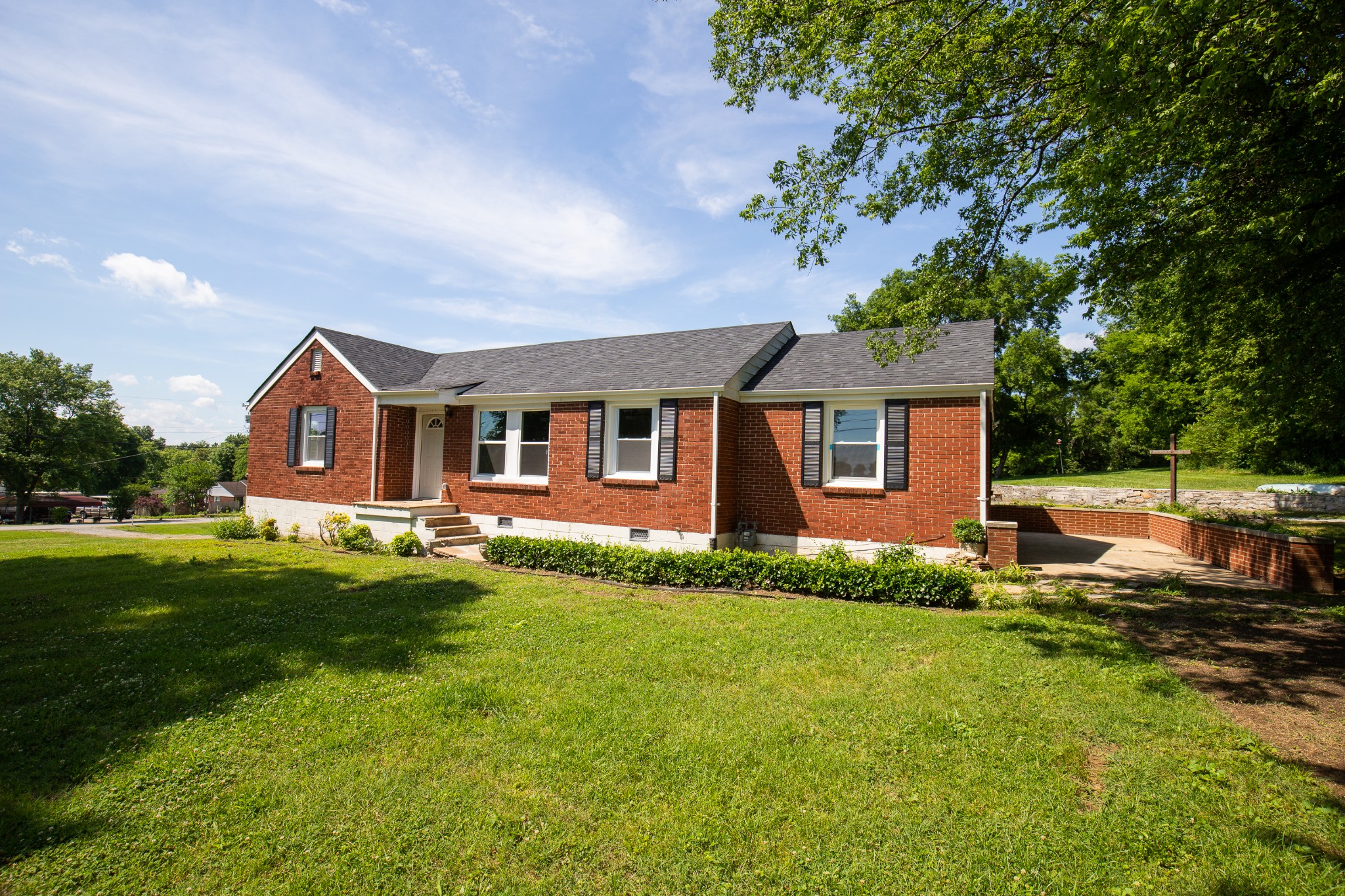 Undisclosed Address Madison, TN 37115 - Photo 2 of 17 a front view of a house with a yard