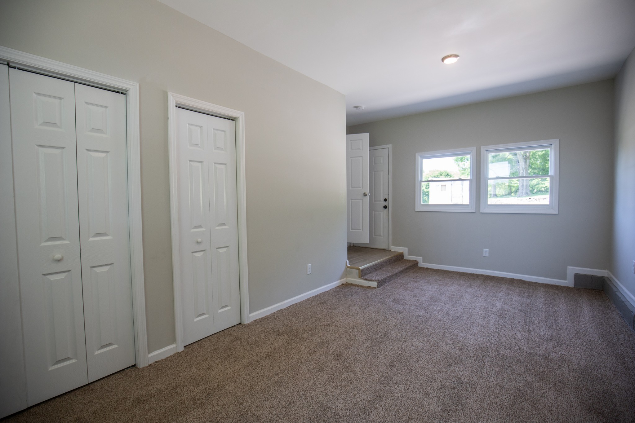 Undisclosed Address Madison, TN 37115 - Photo 7 of 17 an empty room with windows and closet