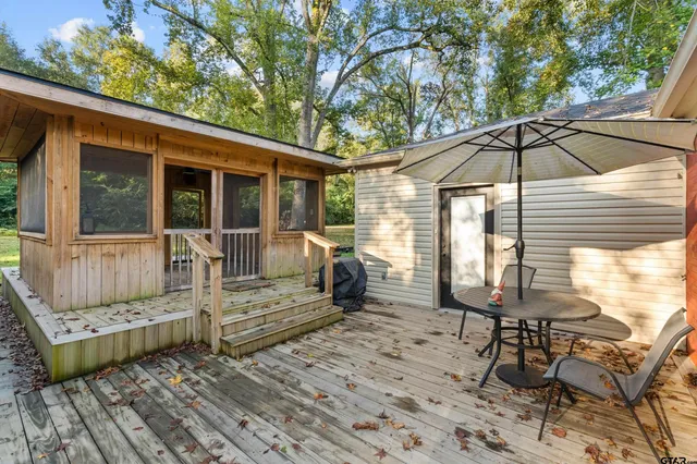 a view of a lounge chairs in the patio