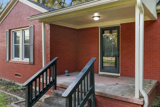 a view of balcony with wooden floor