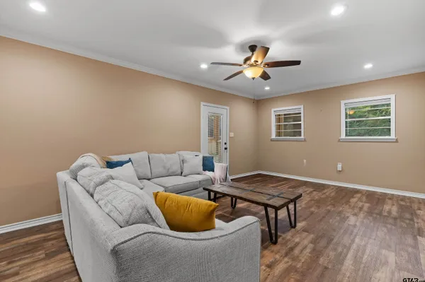 a living room with furniture and a window