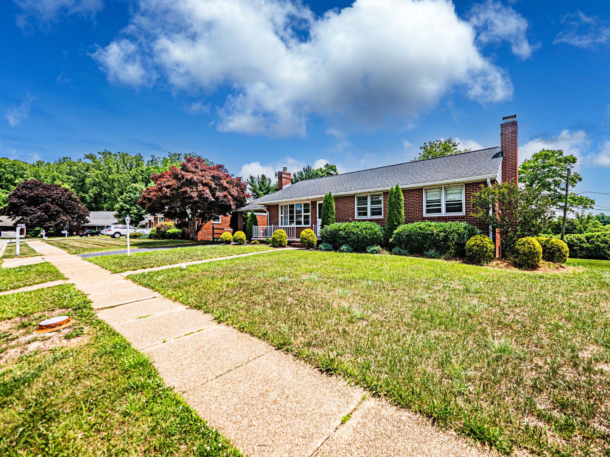 9907 Forge Park Road Perry Hall, MD 21128 - Photo 2 of 36 Charming home with lush greenery.